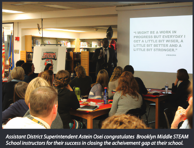 Assistant District Superintendent Astein Osei congratulates  Brooklyn Middle STEAM  School instructors for their success in closing the acheivement gap at their school.